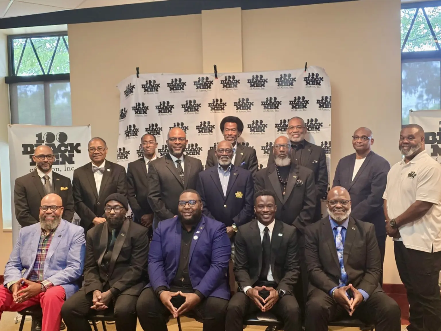 100 Black Men of Akron members gathered for a chapter group portrait