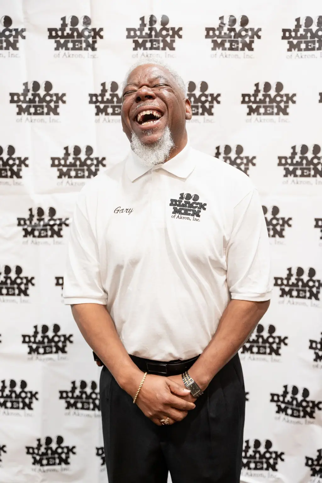 A 100 Black Men of Akron member named Gary sharing a joyful moment